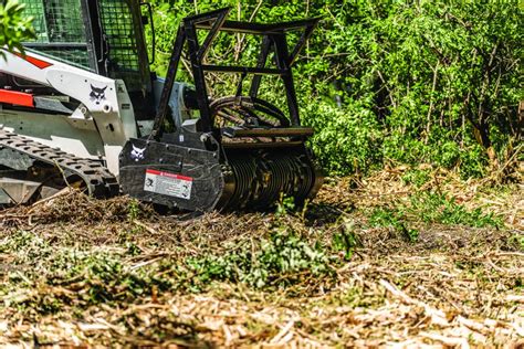 bobcat skid steer rotary tiller|bobcat with brush clearing attachment.